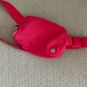 Pink lululemon belt bag